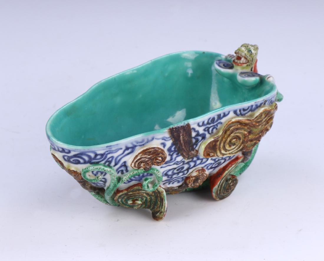 A CHINESE FAMILLE ROSE PORCELAIN LIBATION CUP (1 of 7)