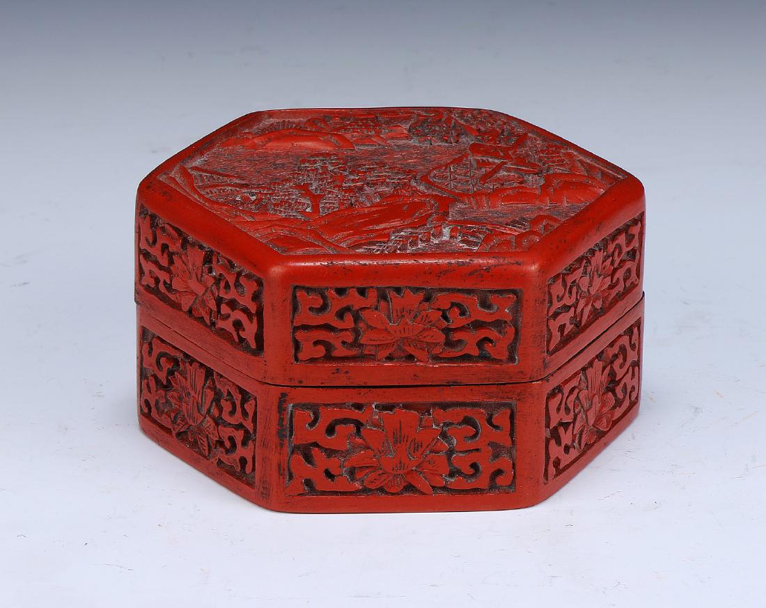 A CHINESE RED CINNABAR LACQUER LIDDED CASE (1 of 2)