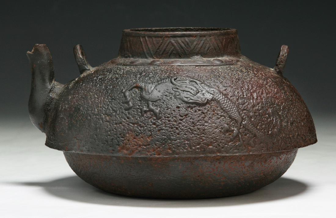 A JAPANESE IRON TEAPOT: A Japanese Iron Teapot; Size: