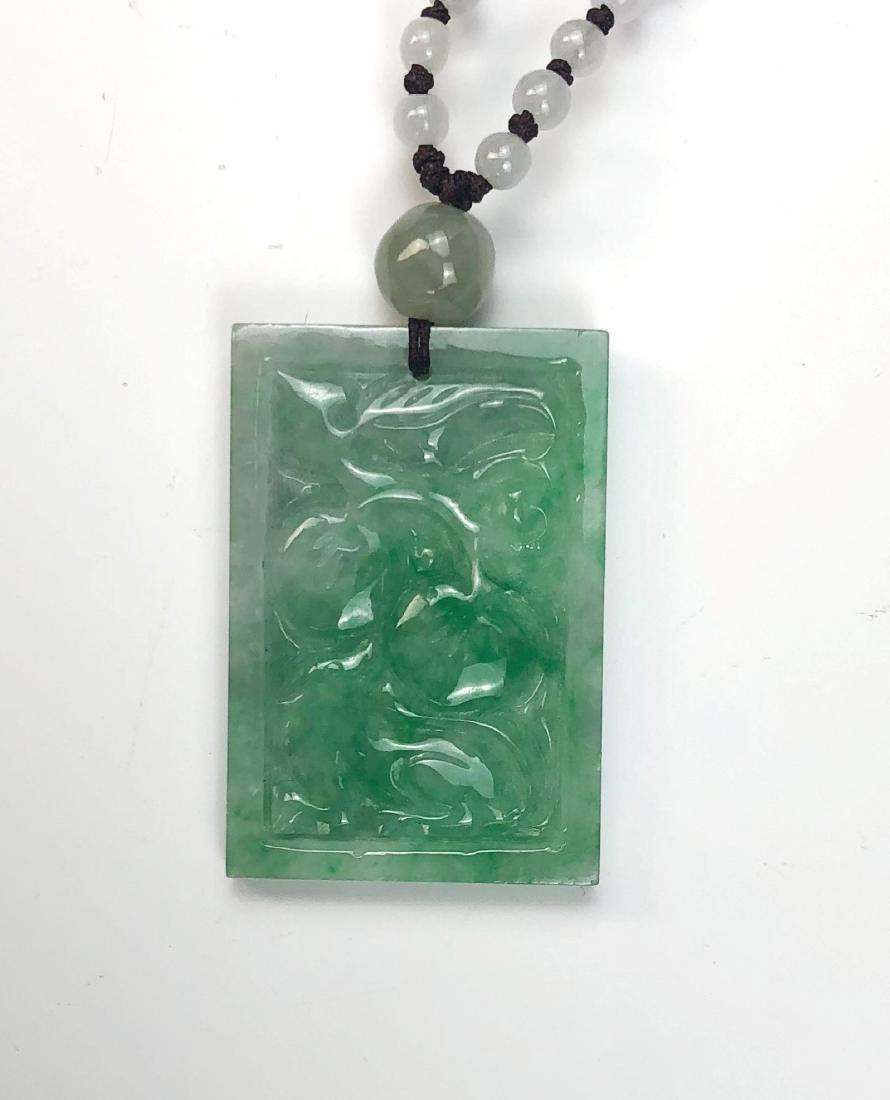 A JADEITE OR LIKE PENDANT WITH NECKLACE (1 of 3)