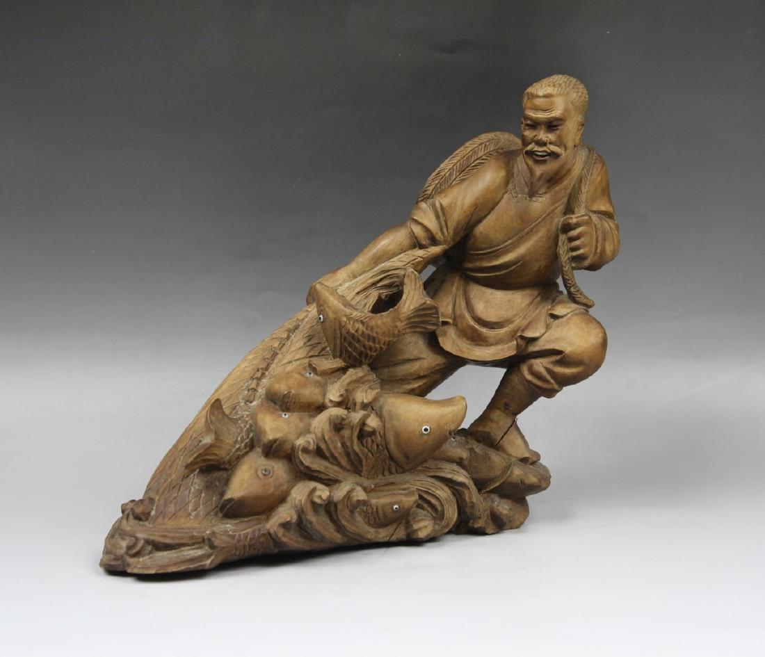 A CHINESE BOXWOOD FISHERMAN CARVING (1 of 7)