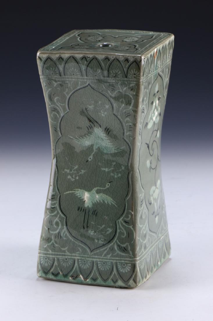 A KOREAN CELADON GLAZED PORCELAIN PILLOW (1 of 4)
