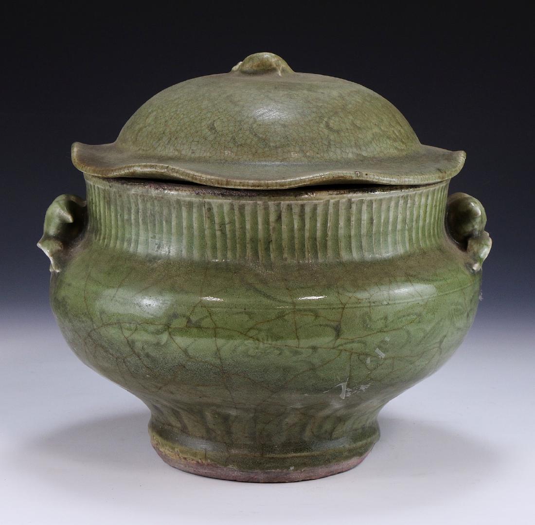 A CHINESE CELADON GLAZED LIDDED PORCELAIN VASE (1 of 3)