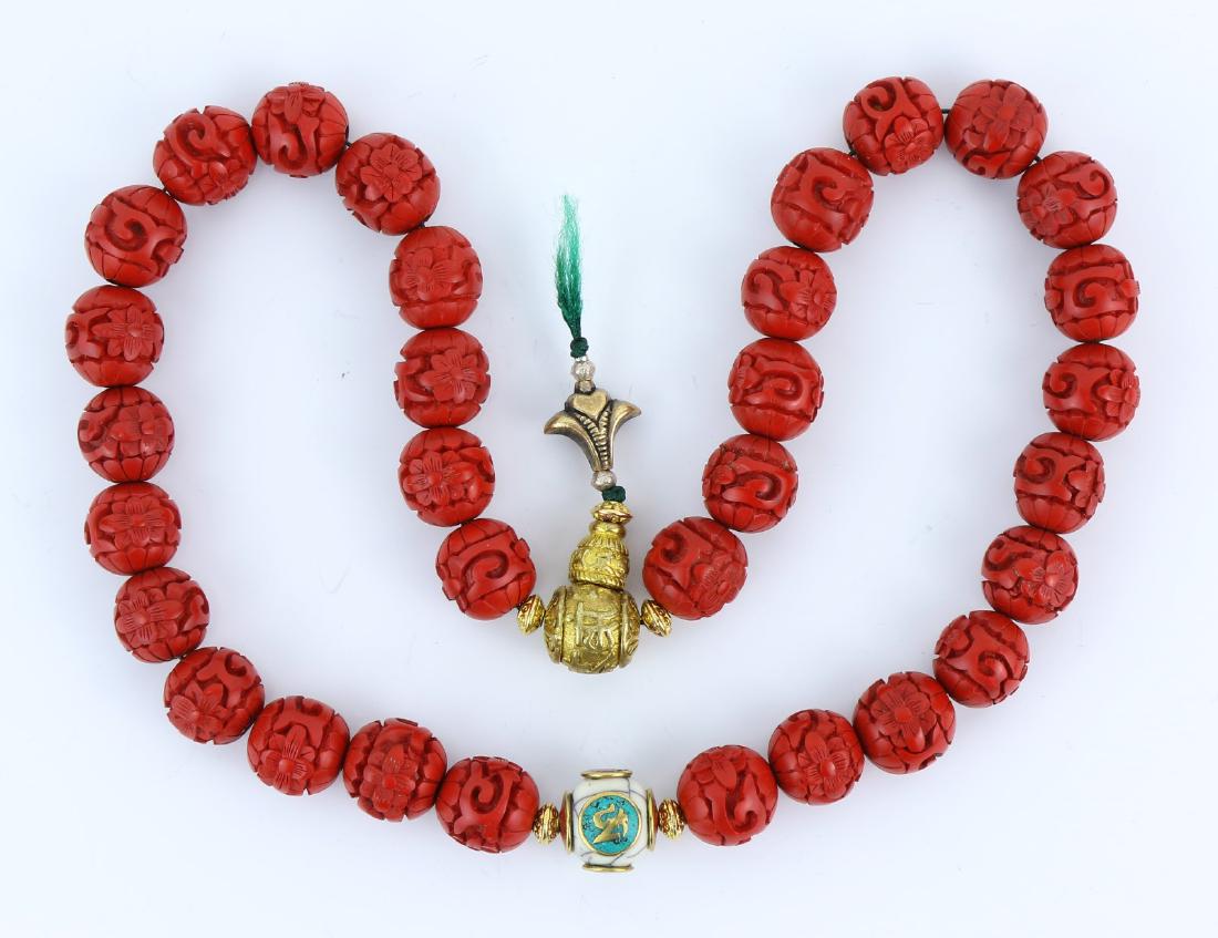 A Chinese Cinnabar Lacquer Necklace (1 of 3)