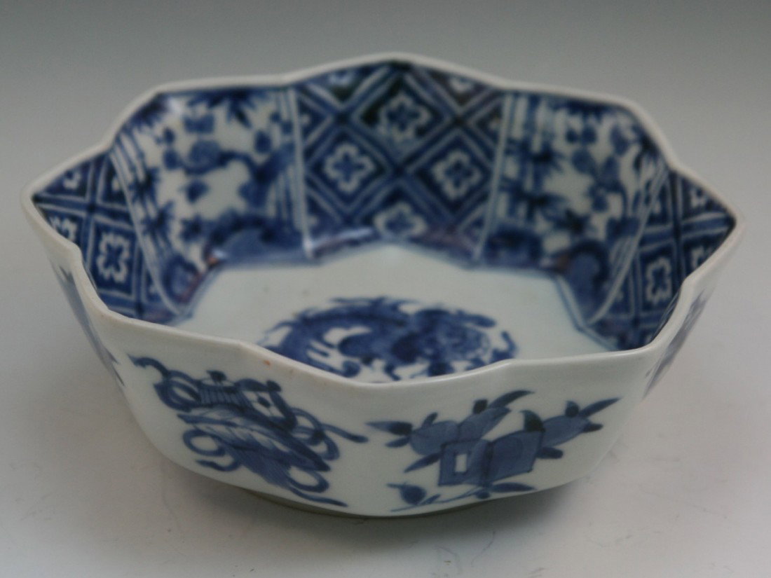 Chinese Ming-Style Blue&White Porcelain Bowl: Chinese Ming-style blue and white porcelain bowl: center with the dragon flying in the clouds; with undulating wave-form rim; four character blue "Chenghua" mark in blue cirle on the base but probably