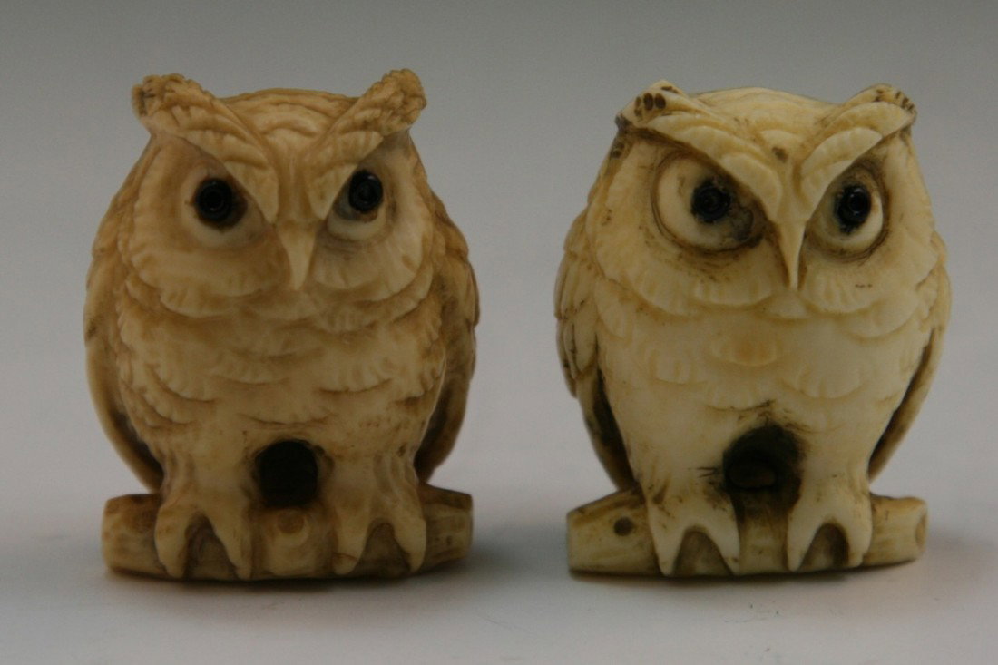 Pair Antique Ivory Netsuke: Owl: detailed carved antique netsuke: two owls standing on stands; with inlaid eyes; H: 1-1/4"