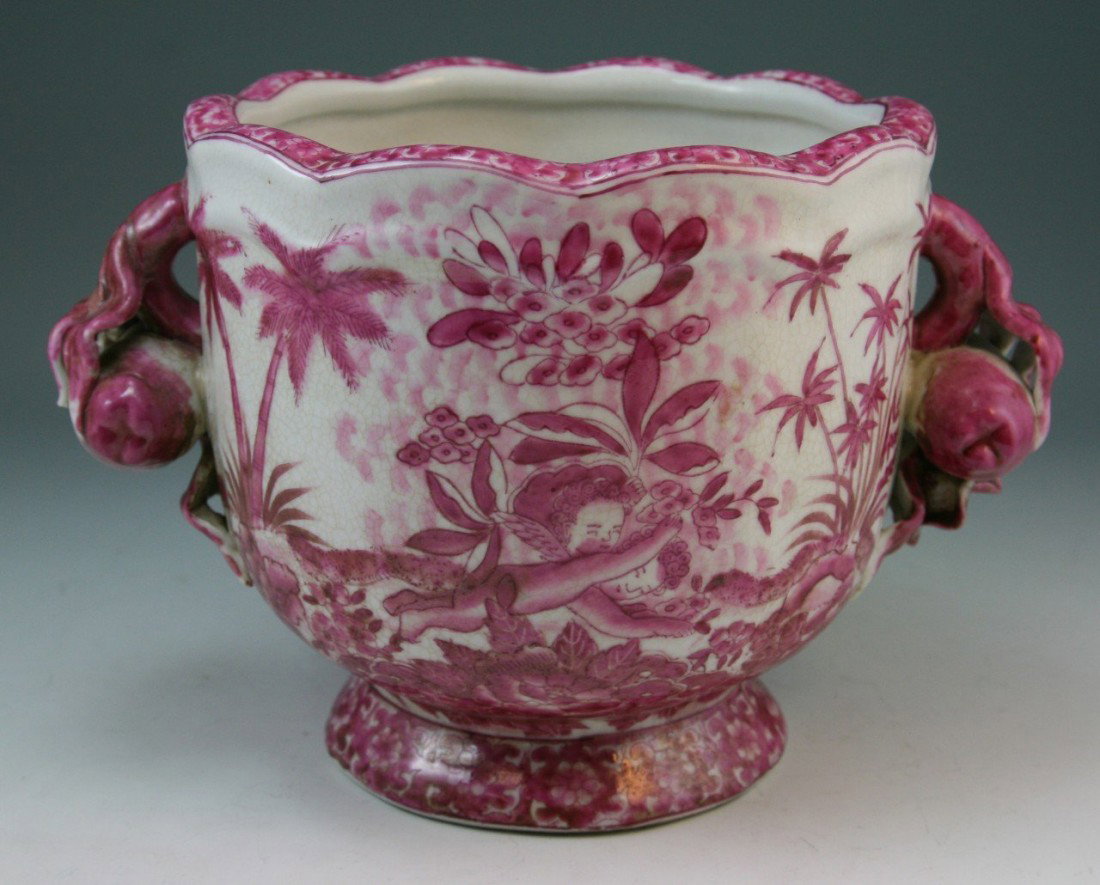 Chinese Minguo Export Rouge-Red Porcelain Vase: Rare finely painted Chinese export rouge-red porcelain vase: of somewhat square form with two strap-shaped handles; with the design of four angels playing among voluptuou flowering peony blossoms amid