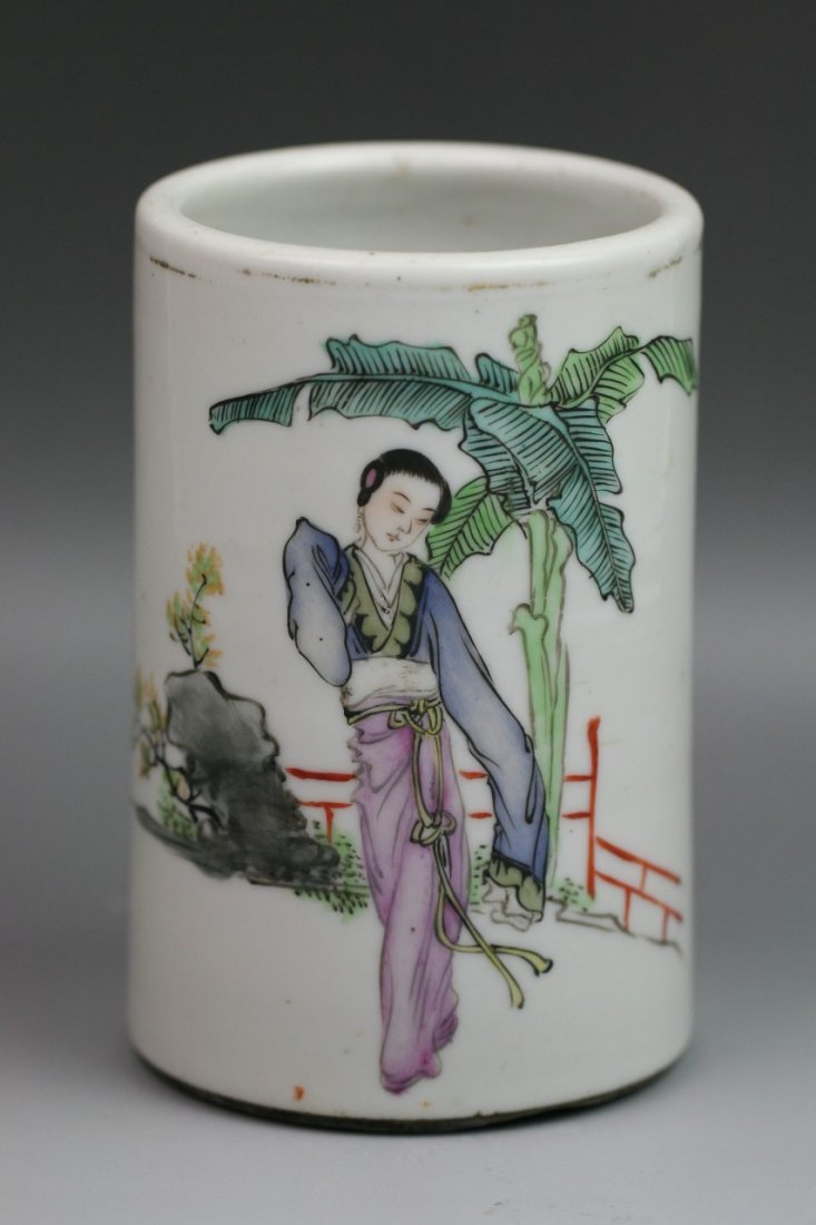 Chinese Antique Famille Rose Porcelain Brush Pot: Chinese antique famille rose porcelain brush pot: with the design of a beauty standing in a garden with rocks and plantain tree; with calligraphy poem; coral red four character seal mark on the base; 