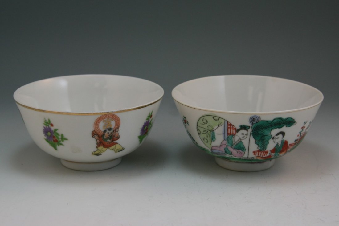 Pair Chinese Minguo Famille Rose Porcelain Bowls: Pair unusual Chinese famille rose porcelain bowls: both with gilt rim; one with the design of kids, Chinese lucky characters and flowers to the exterior; together with the one with two ladies in garde