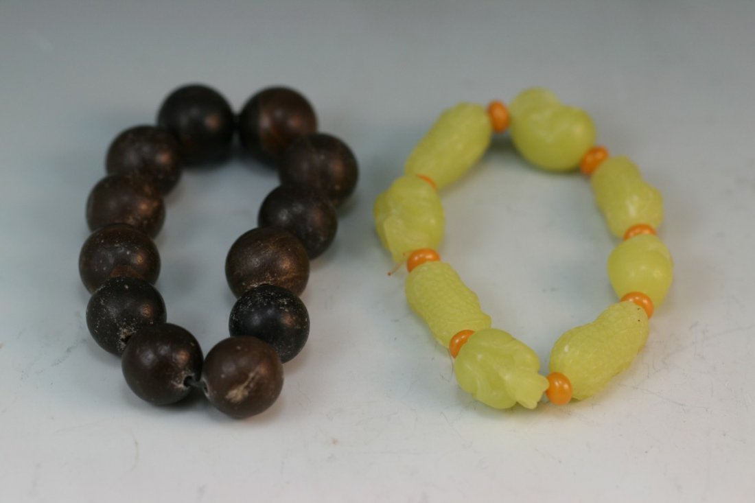 Two Soapstone And Yellow Jade-Like Bracelets: Chinese carved two soapstone and yellow jade-like bracelets; D: 3"
