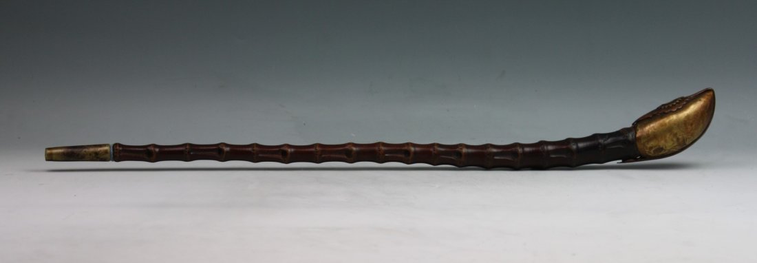 A Bamboo Tobacco Pipe: A Bamboo Tobacco Pipe: with bamboo knots on body; Size: L: 22-1/4"