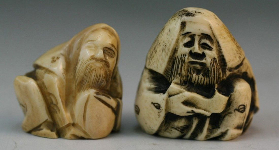 Two Carved Antique Ivory Netsuke: Two carved ivory netsuke: one older man sitting with a pipe in his hand; the other is a man squatting down to pick up a rock; Size: 1-1/2" (high)