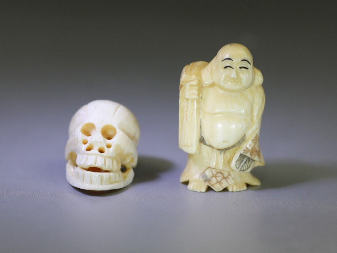 Two Antique Ivory Netsukes: Skull and Monk: Two Antique Ivory Netsukes: Skull and Monk, monk with sign on the base, 19th Century; Size: H: 1-1/2"