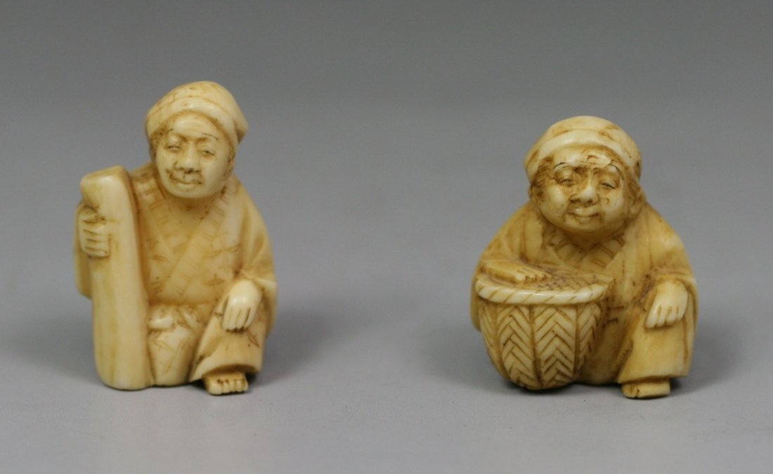 Pair Of Antique Ivory Netsukes: Pair of Antique Ivory Netsukes: two men kneeling on my leg while holding a basket and stick in their hands.; Size: H: 1-1/4"