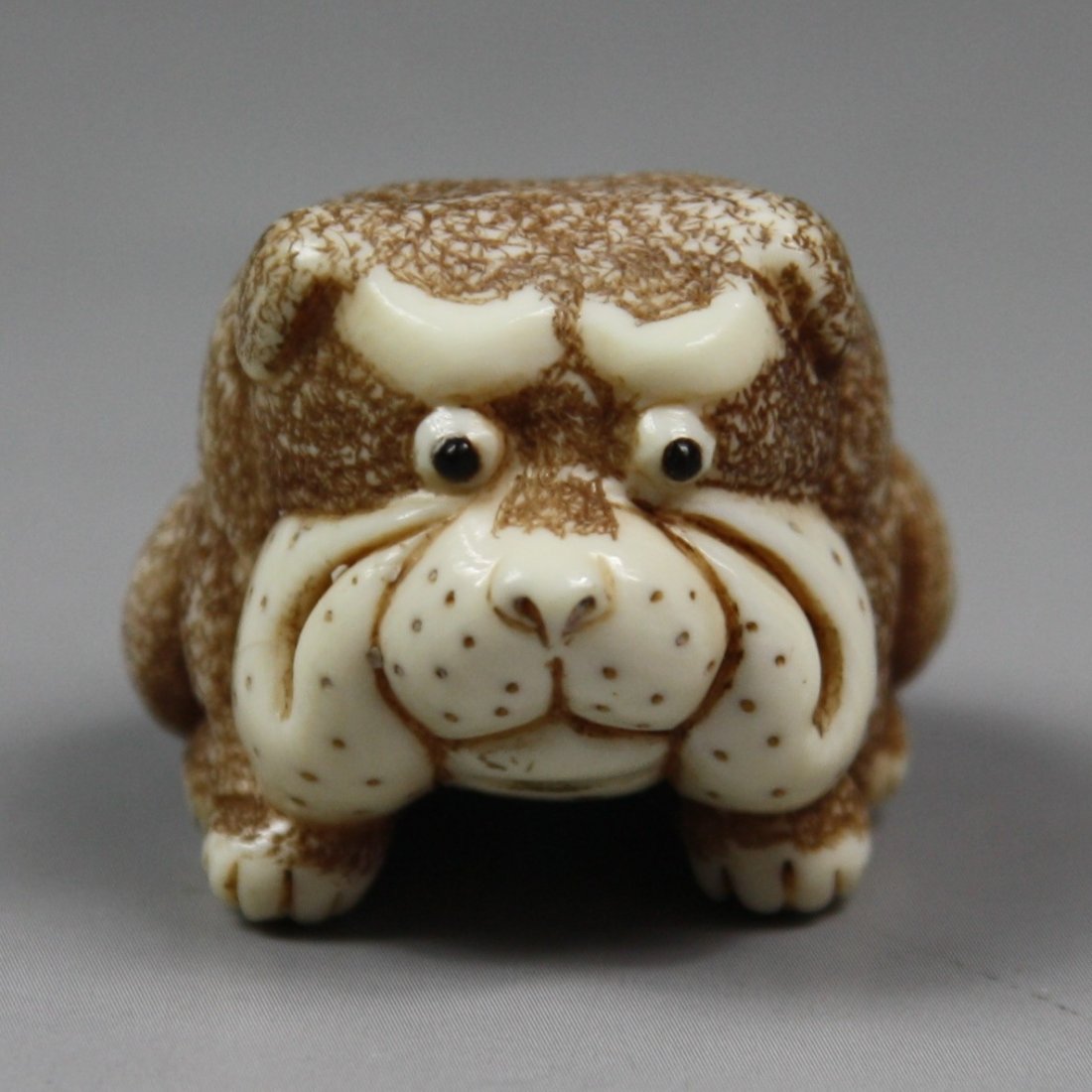 An Antique Ivory Netsuke: Puppy: An Antique Ivory Netsuke: Puppy; Size: H: 1"