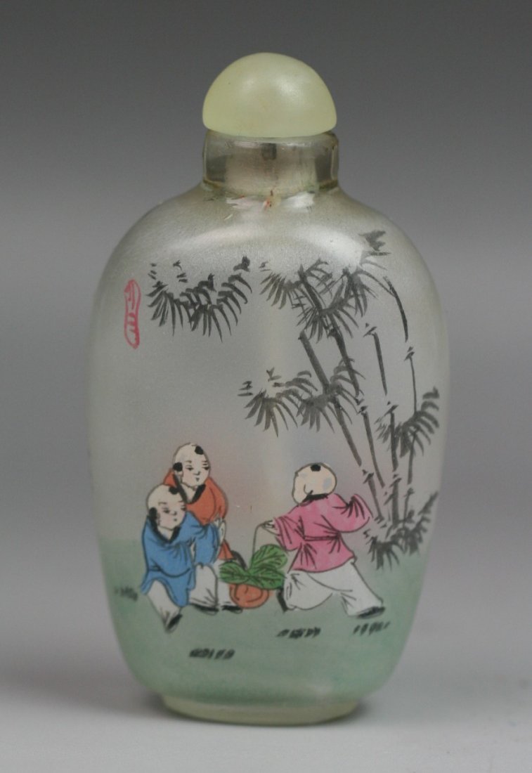 Chinese Antique Inside-Painted Glass Snuff Bottle: Finely inside painted rock crystal(quartz) snuff bottle: both sides with the scene of kids playing in a yard by a tree, signed on both sides: rose quartz and ivory stopper, Minguo period; Size: H: 3-1