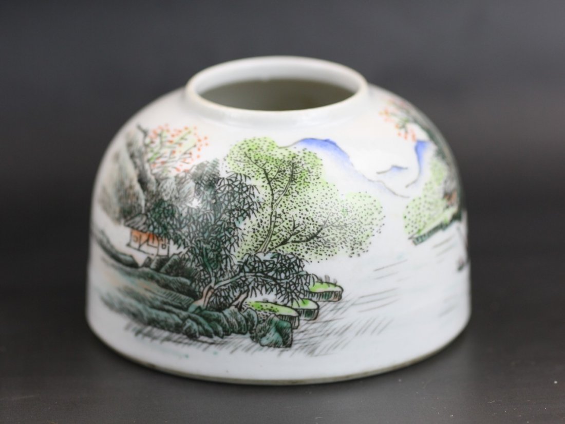 A Chinese Famille Rose Water Dropper: A Chinese Famille Rose Water Dropper: painted around the body with moutainous riverscape under transparent glaze, signed by Wang, Youtang, early 20th Century; Size: D: 3"