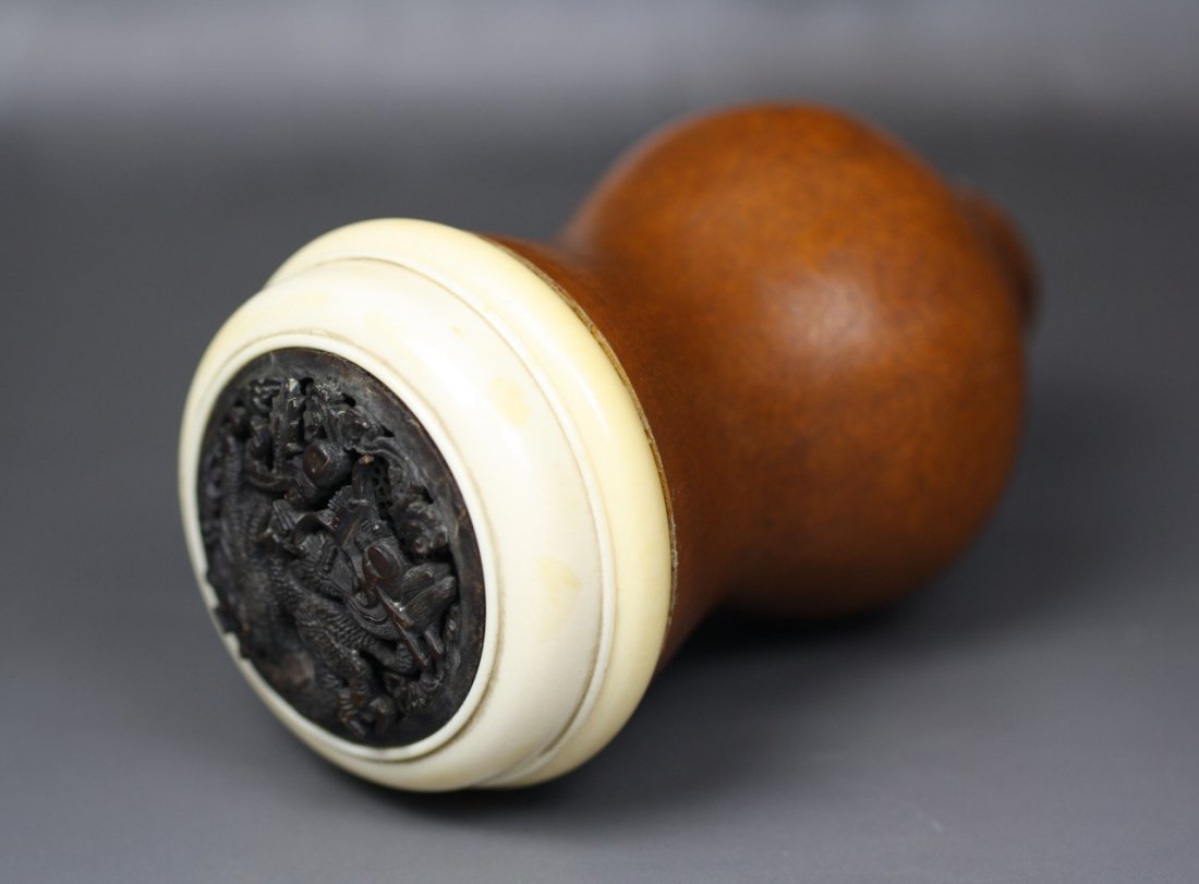 A Qing Chinese Gourd Cricket Cage With Ivory: A Qing Chinese Gourd Cricket Cage With Ivory: of double gourd form, with a moulded ivory collar and fitted cover of tortoiseshell reticulated with dragons, Qing Dynasty; Size: H: 5"