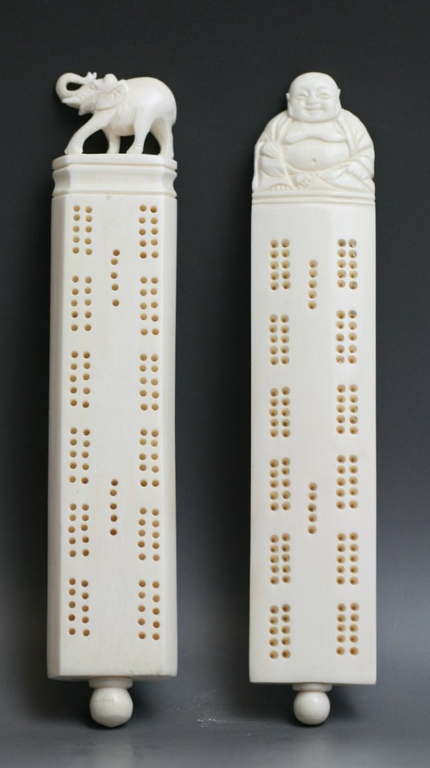 Two Full-Set Chinese Ivory Cribbage Boards: Two Full-Set Chinese Ivory Cribbage Boards: one with Buddhist seated on the top, the other one with an elephant on the top, early 20th century; Size: L: 6-1/4"