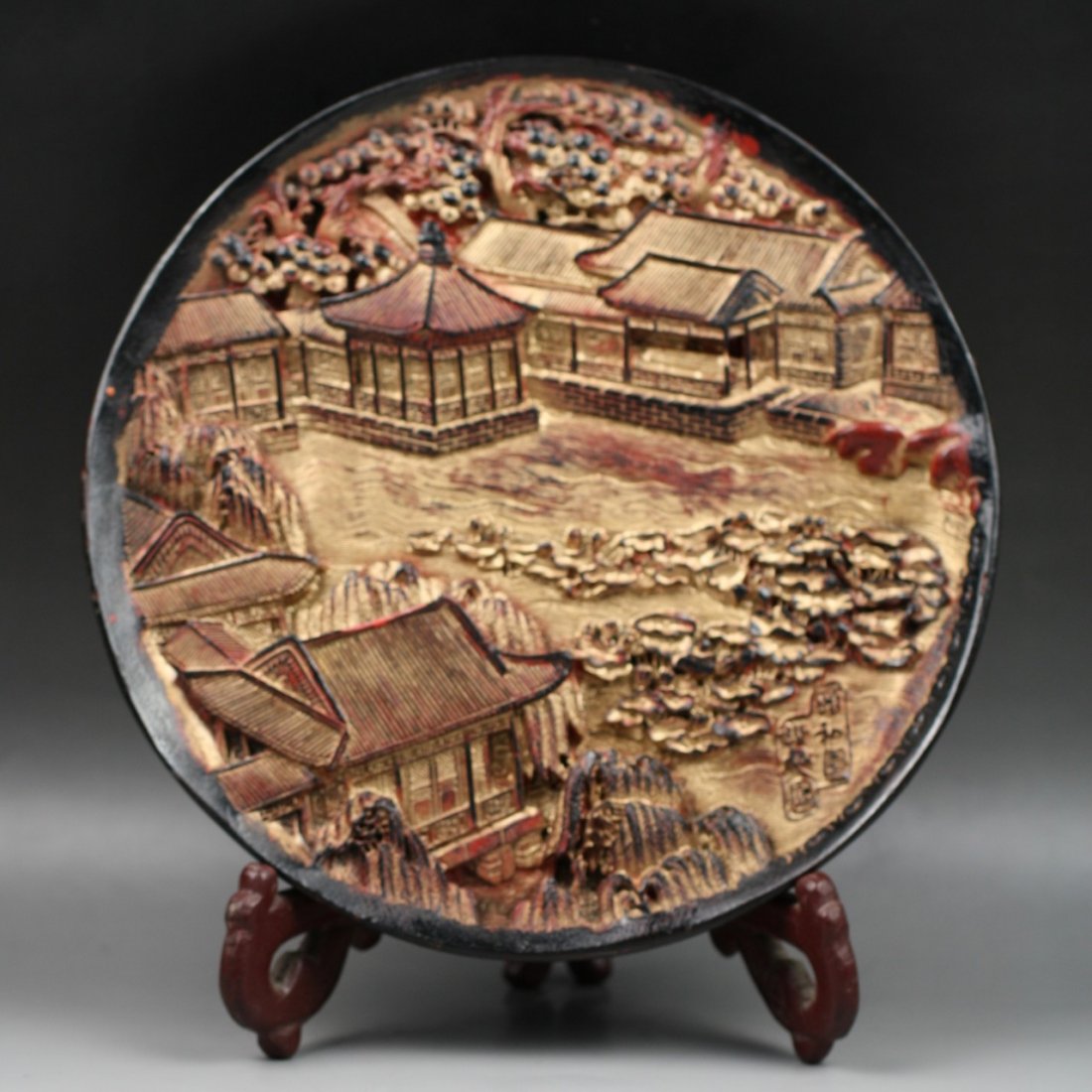A Chinese Antique Gilt Lacquered Display Plate: A Chinese Antique Gilt Lacquered Display Plate: with wood stand, Size: D: 9-3/4"