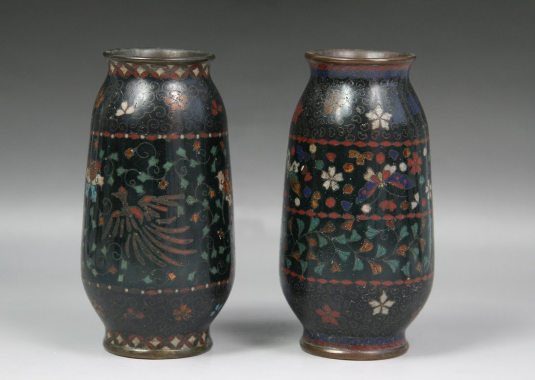 A Pair Japanese Cloisonne Enamel Vases: A Pair Japanese Cloisonne Enamel Vases: enamelled on the body with phoenix in flight amid scrolling vines, reserved on black ground, Minguo Period; Size: H: 5-7/8"