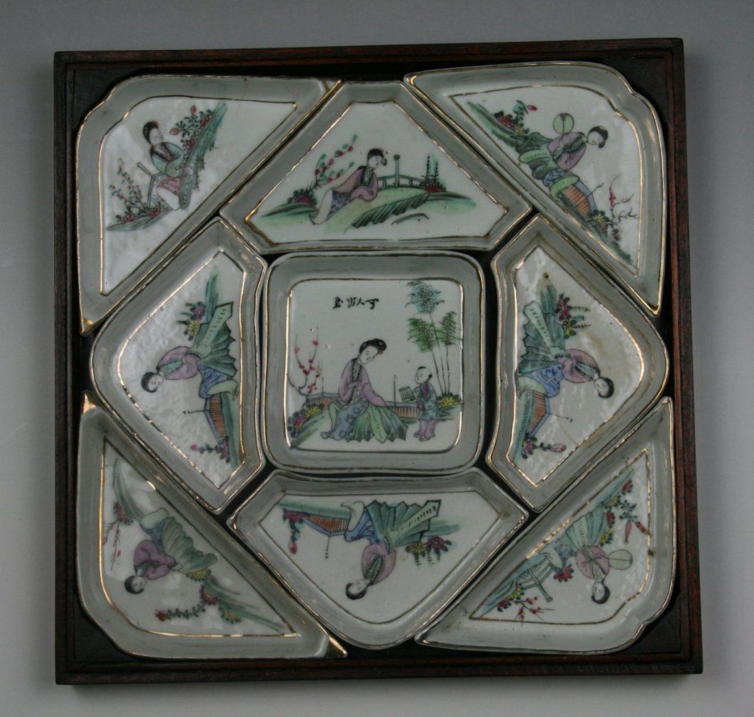 Set Of Chinese Famille Rose Sweet Meat Trays: Set Of Chinese Famille Rose Sweet Meat Trays: all nine dishes are of three different shapes, each dish has either a beauty or with a kid, the set in wood box, of Minguo Period; Size: L: 10-1/4"; H: 10
