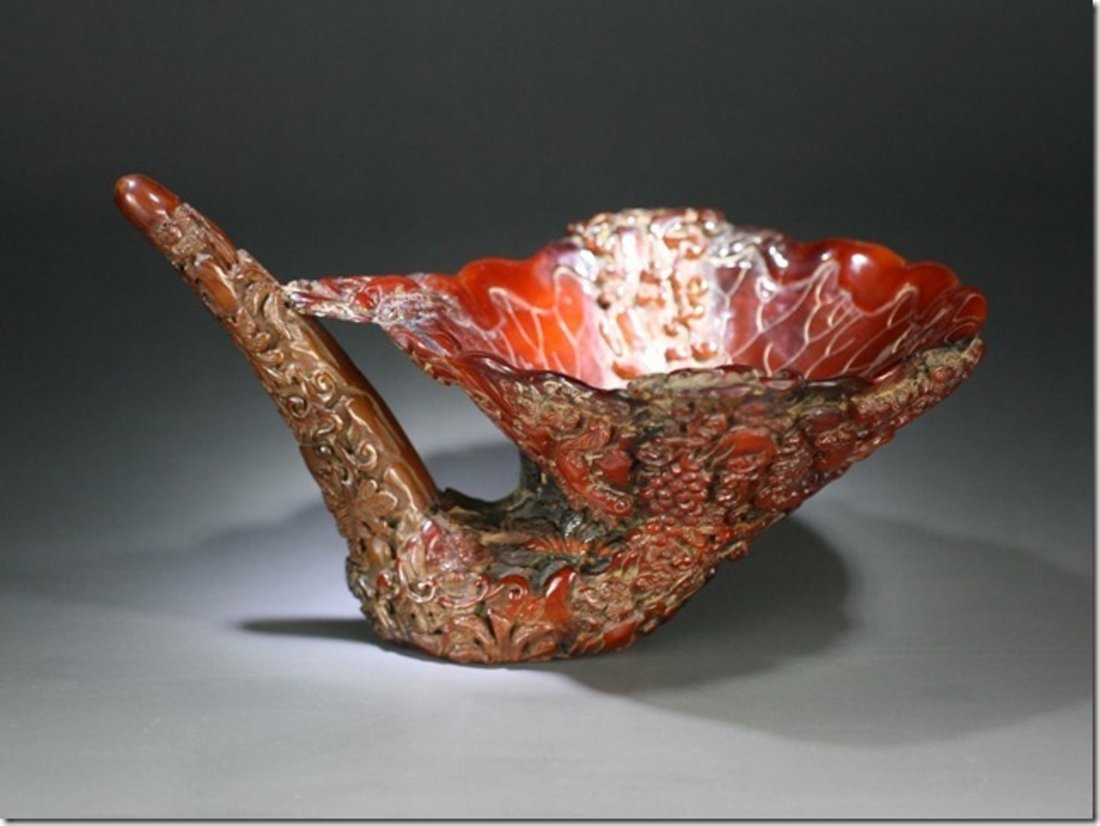 A Rare Chinese Qing Rhinoceros Horn Libation Cup: A Rare And Masterfully Carved Chinese Qing Rhinoceros Horn Libation Cup: this gorgeous rhinoceros horn carving features rich brown to honey tone color and with incredible craftsmanship, very finely ca