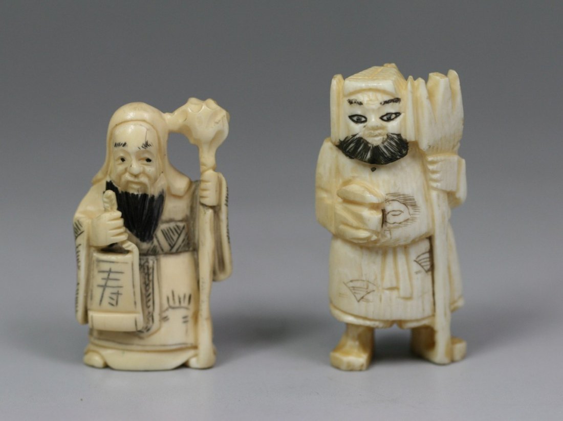 Pair Of Antique Ivory Netsukes: Pair of Antique Ivory Netsukes: two men standing while holding tools in their hands.; Size: H: 2-1/8"