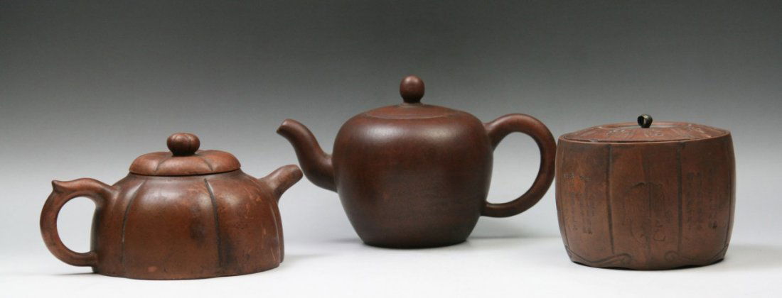 Three Chinese Zisha Teapots And Box: Three Chinese Zisha Teapots And Box; Size: L: 7-1/2" (biggest)