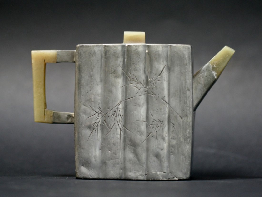 A Chinese Antique Jade & Tin Zisha Teapot: 清 包錫紫砂胎三鑲玉竹紋壺 A Chinese Antique Jade & Tin Mounted Zisha Teapot: of Qing Dynasty; Size: L: 5-1/4"
