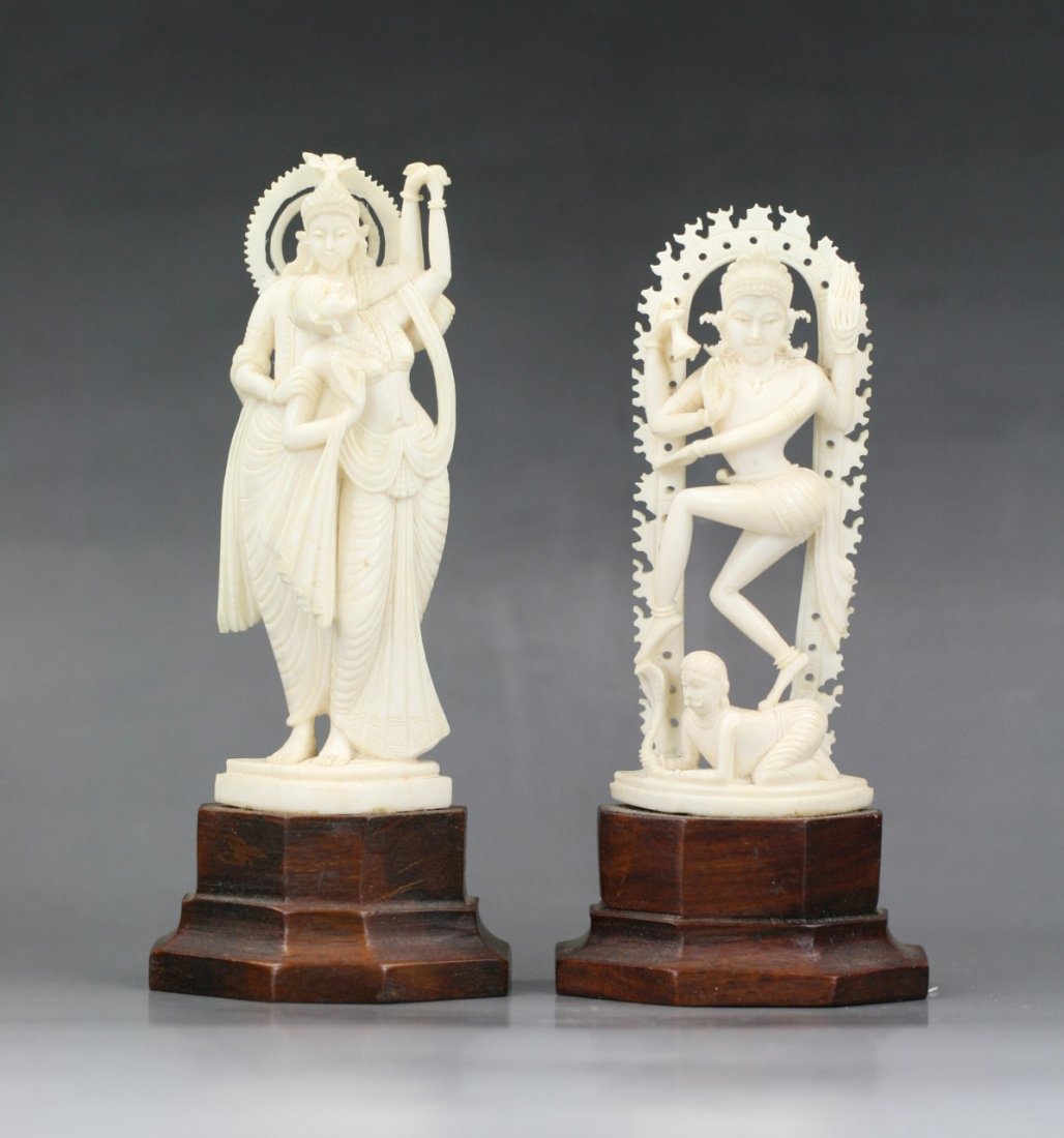 Two Indian Antique Ivory Goddesses: Two Indian Antique Ivory Goddesses: fully reticulated carved throughout as two goddesses, both mounted on matching wood stands, of 19th/20th Century; Size: H: 3-1/2" (ivory)