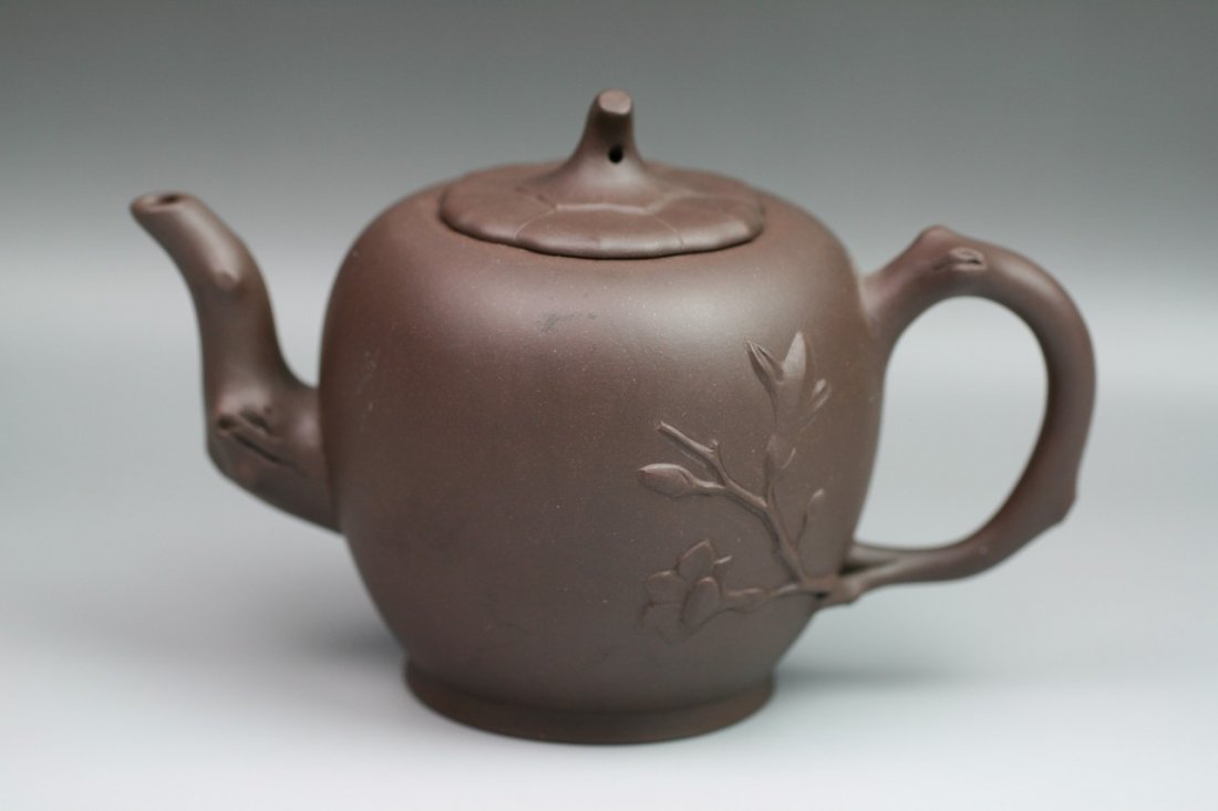 A Chinese Vintage Zisha Teapot: A Chinese Vintage Zisha Teapot: signed Yixing Ware Zisha teapot by Gao Zhong, with spout and handle of open-work design of flower branch, lidded with pumpkin-shaped cover, with three character sign on