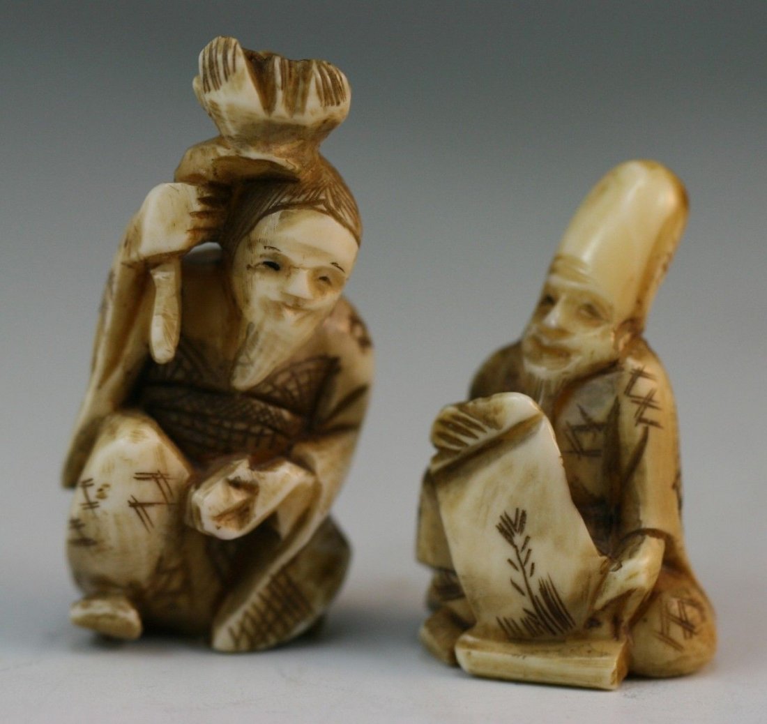 Two Carved Antique Ivory Netsuke: Pair carved ivory netsuke: one man with a long head sitting down holding a scroll, the other is a man holding something on top of his head; Size: H: 1-3/4" (Higher)