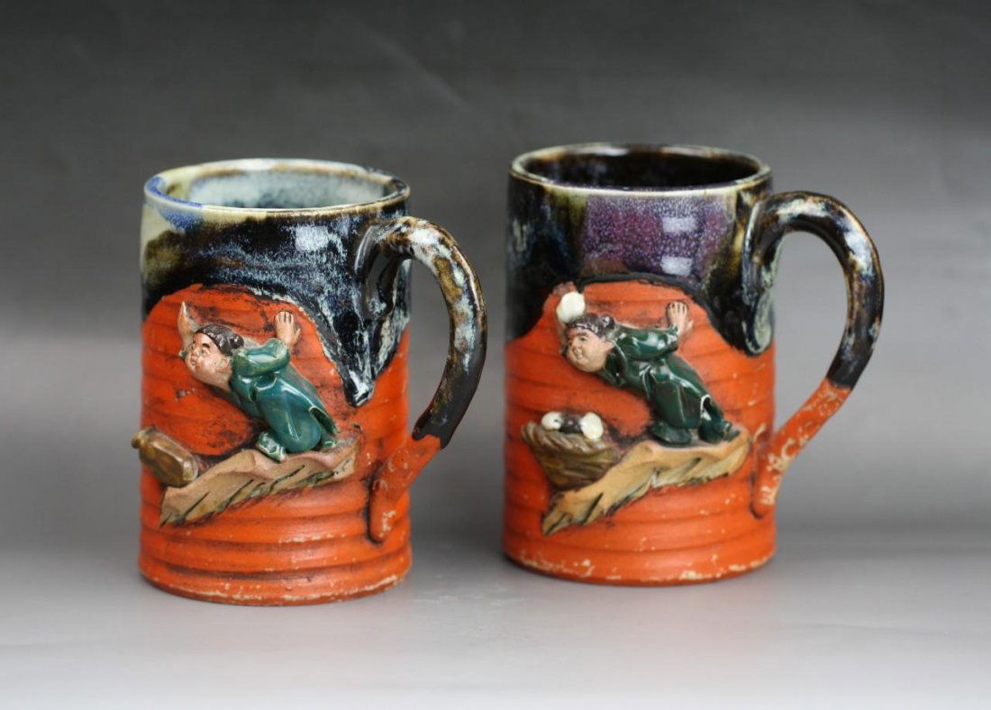 Two Japanese Antique Sumida Gawa Porcelain Cups: Two Japanese Antique Sumida Gawa Porcelain Cups: both with C-Shaped handles, signed on the base, late 19th Century; Size: H: 4-1/2"