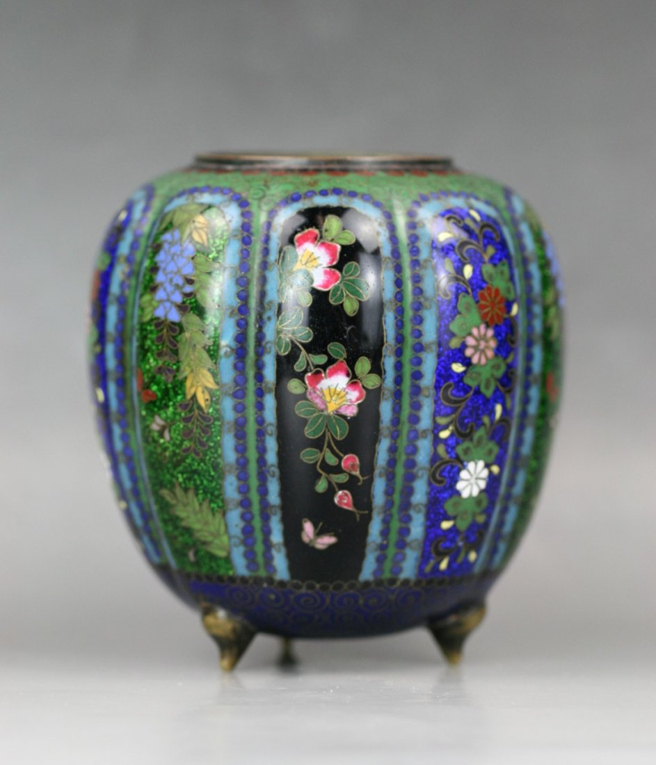 A Japanese Antique Silver Ando Cloisonne Vase: A Japanese Antique Silver Ando Cloisonne Vase: of globular body with broad mouth, reserved on a royal blue ground, of 19th Century; Size: H: 4"