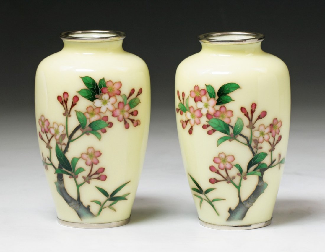 Pair Japanese Antique Silver Ando Cloisonne Vases: Pair Japanese Antique Silver Ando Cloisonne Vases: both of baluster forms with short necks rising to flaring rims, finely enamelled around the bodies with blooming peony blossoms with leafy stems, all