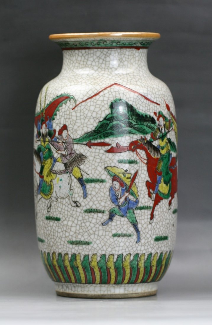 A Chinese Antique Famille Verte Vase: A Chinese Antique Famille Verte Vase: painted of warriors on battle field on crackled ground, of Minguo period; Size: H: 9-3/4"