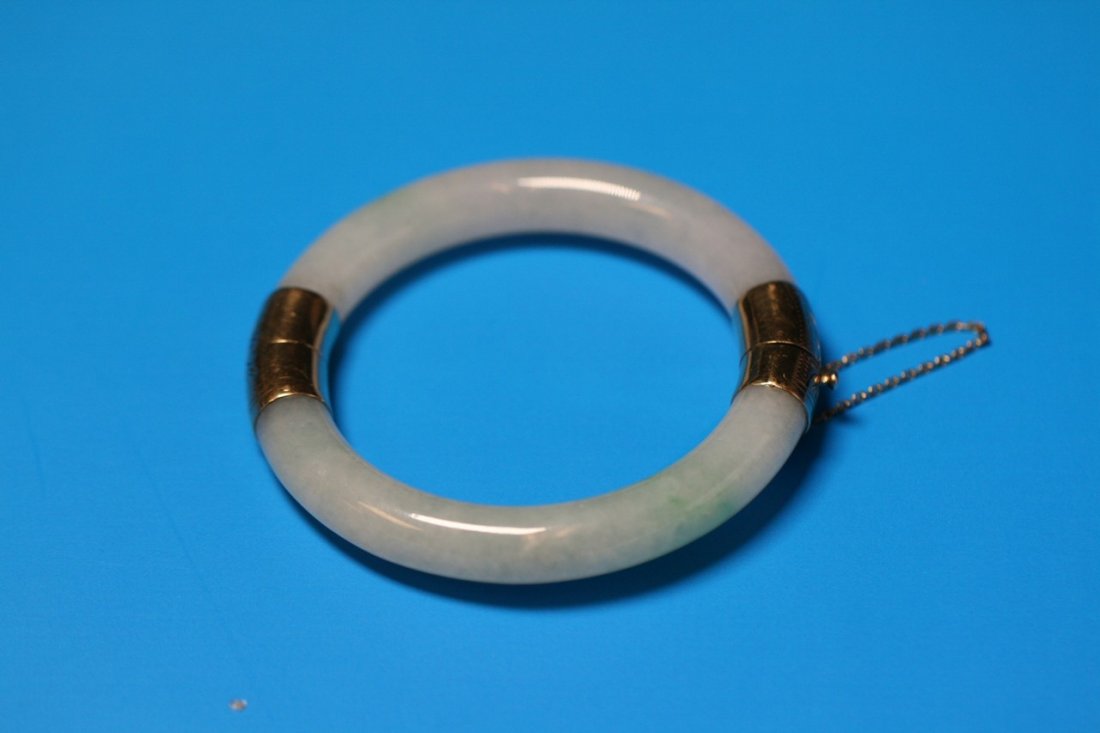 An Antique Jadeite Bangle With 14K Gold