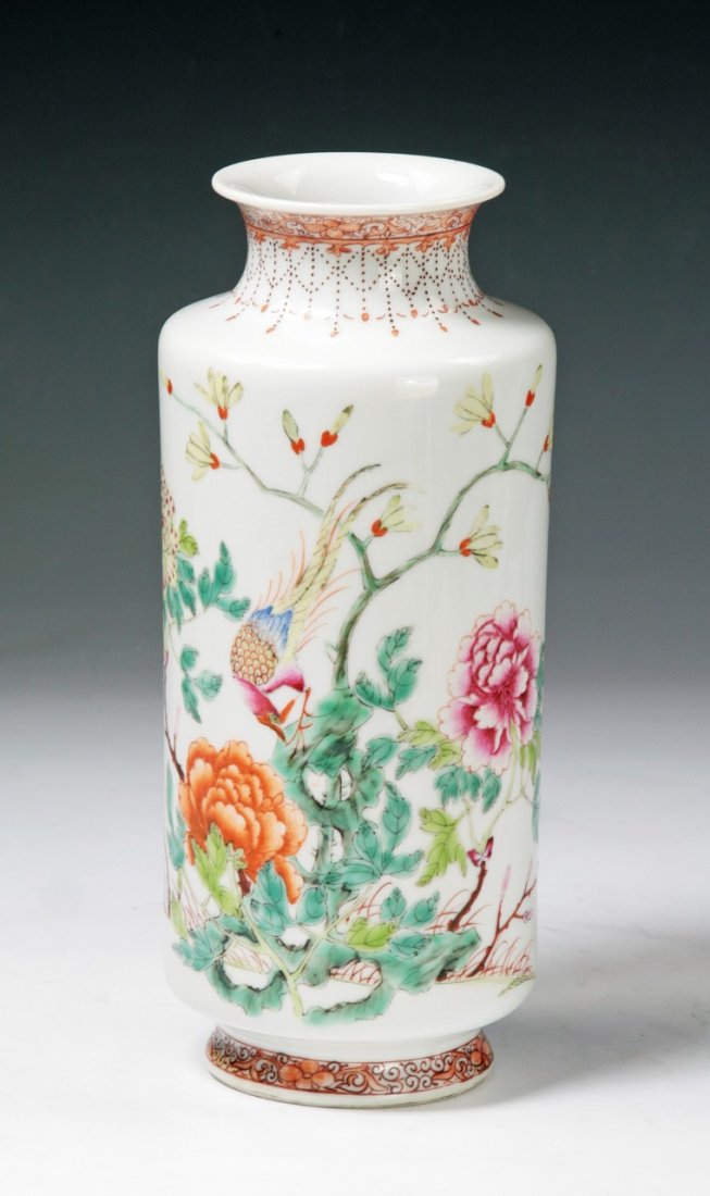 A Chinese Antique Famille Rose Porcelain Vase: A Chinese Antique Famille Rose Porcelain Vase: painted around the cylindrical body with the scene of a bird perched amid blooming branch issuing from rockwork, of Minguo period; Size: H: 9-1/2"
