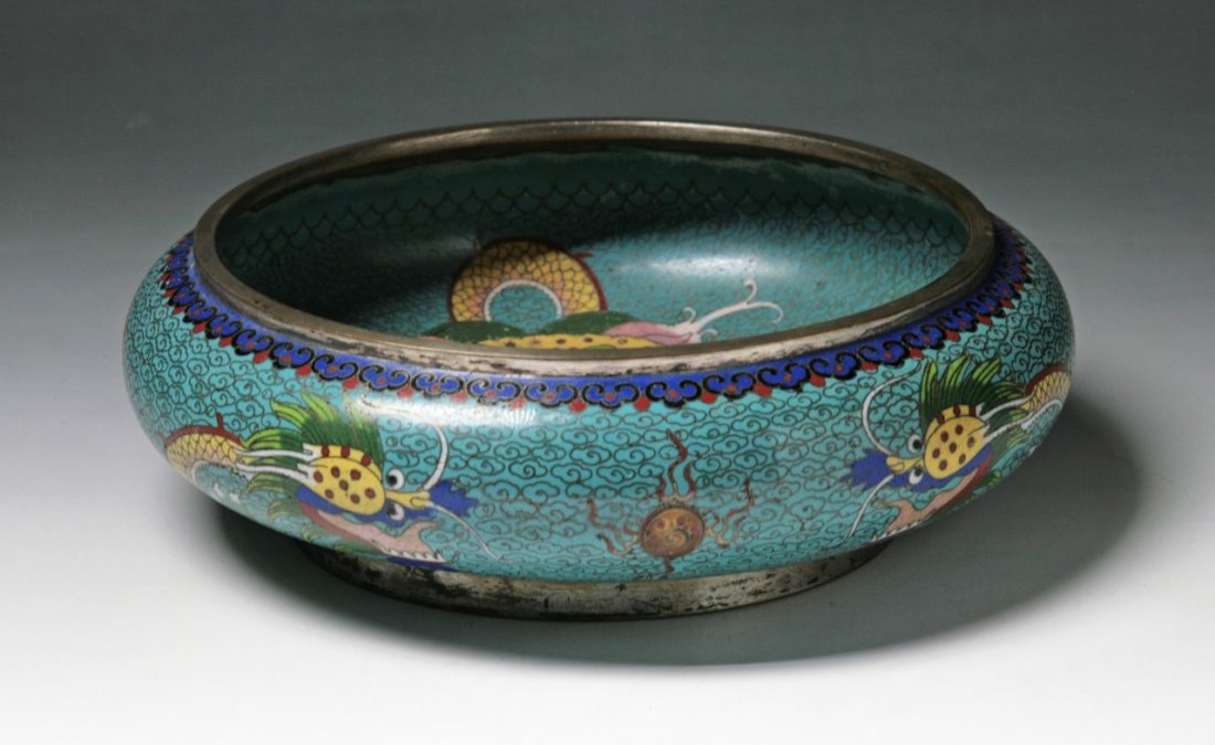 A Chinese Antique Cloisonne Bronze Brushwasher: A Chinese Antique Cloisonne Bronze Brushwasher: reserved on a blue ground, of late Qing or Minguo period; Size: D: 8-1/4"