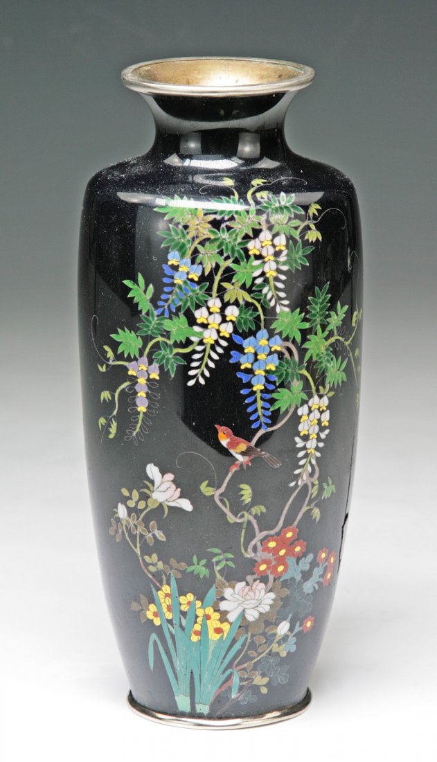 A Japanese Antique Silver Ando Cloisonne Vase: A Japanese Antique Silver Ando Cloisonne Vase: finely depicting birds perched on blooming trees, all reserved on a black ground, of 19th Century; Size: H: 7-1/2"
