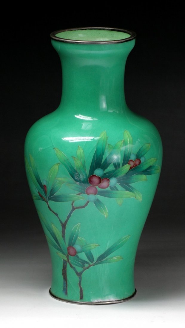 A Japanese Antique Silver Ando Cloisonne Vase: A Japanese Antique Silver Ando Cloisonne Vase: of elegant shouldered body with cylindrical neck, finely enameled with blooming branches, reserved on a bright apple green ground, of 19th Century; Size: