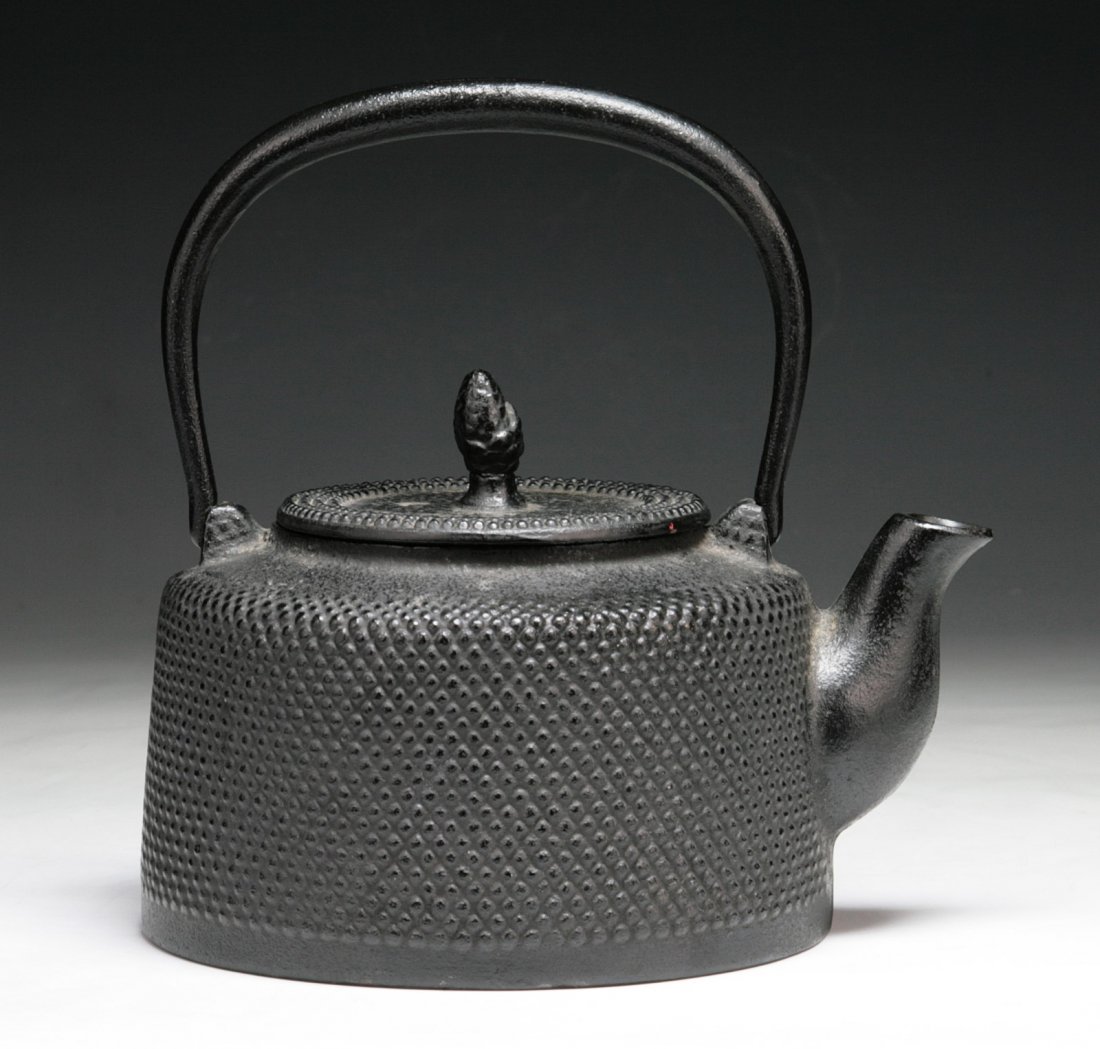 An Antique Japanese Iron Teapot: An Antique Japanese Iron Teapot: of 19th Century; Size: L: 8"; H: 8-1/2