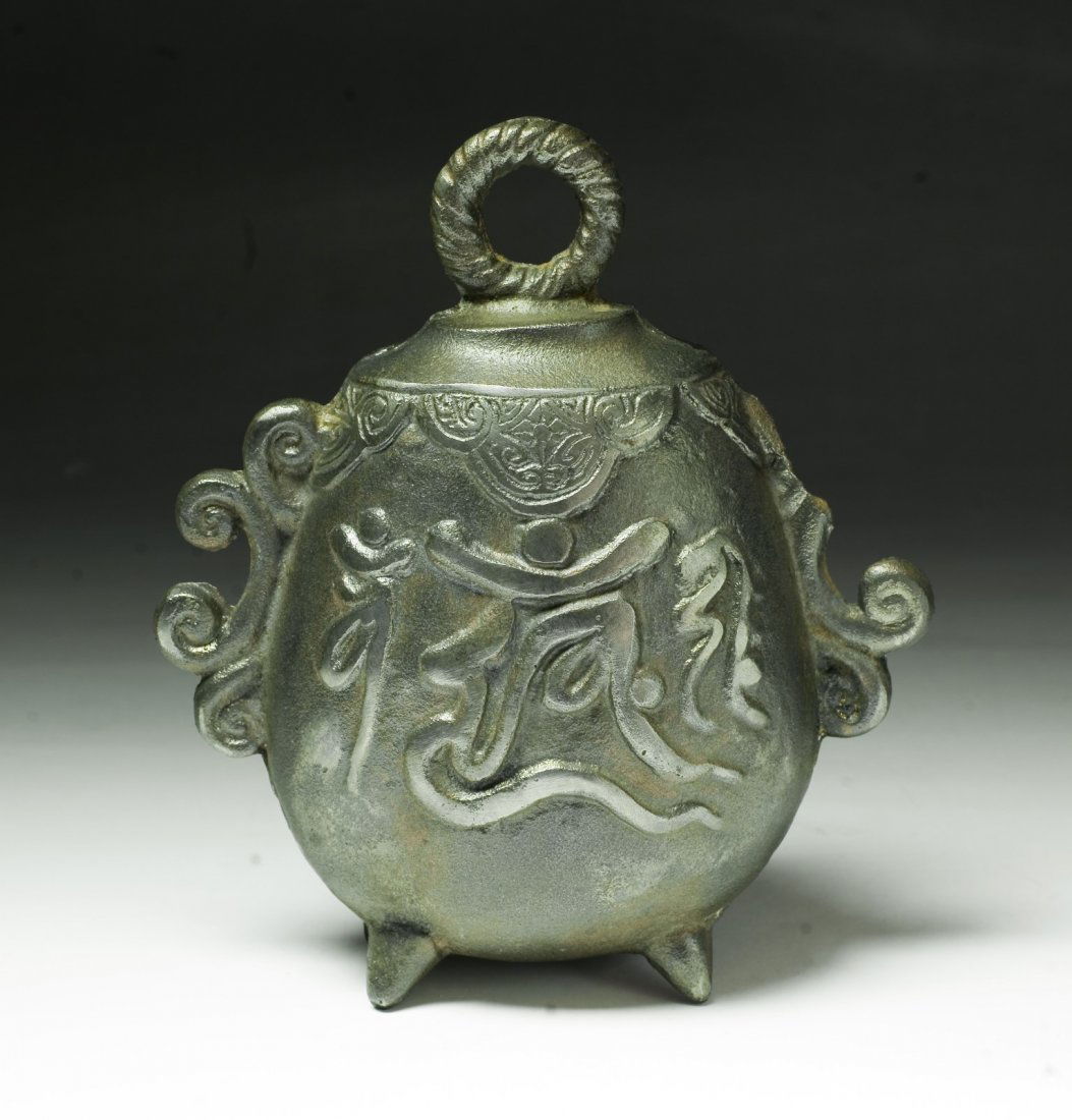 A Japanese Antique Bronze Bell: A Japanese Antique Bronze Bell: of bell shape with cover, circa 1900; Size: H: 7"