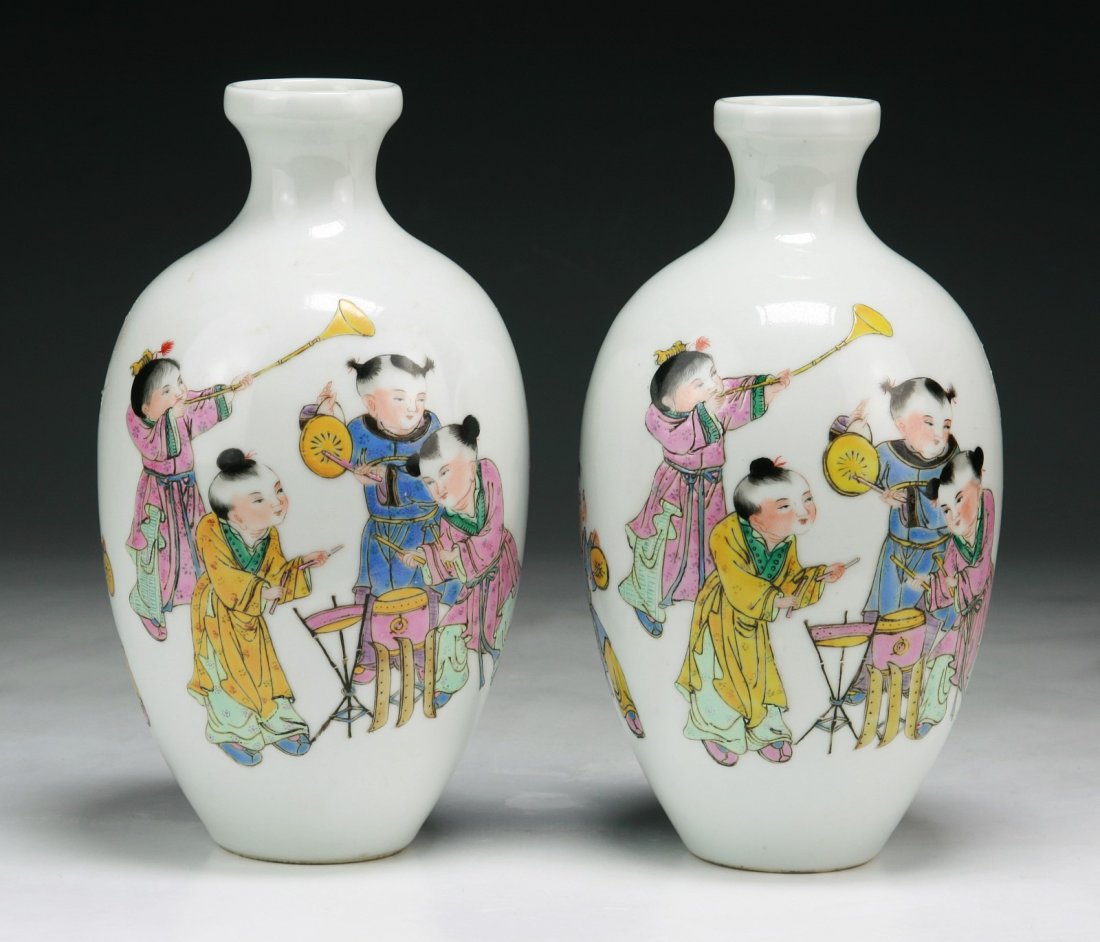Pair Chinese Antique Famille Rose Porcelain Vases: Pair Chinese Antique Famille Rose Porcelain Vases: both of rounded shouldered form, finely painted with the scene of children playing instruments in a courtyard, of Minguo Period; Size: H: 7-1/2"