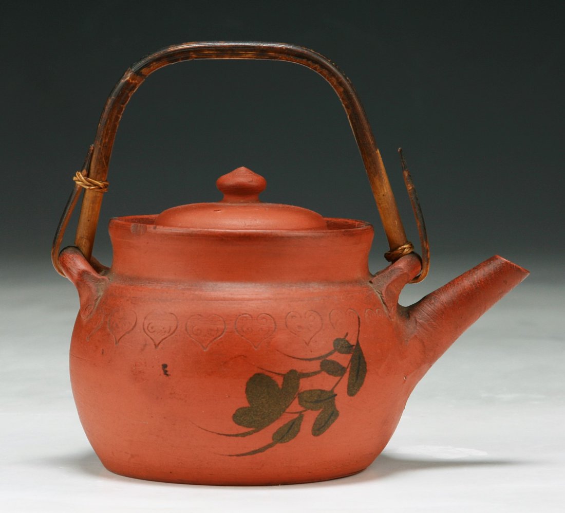 A Chinese Zisha Teapot: A Chinese Zisha Teapot; Size: H: 5"; L: 5-1/2"
