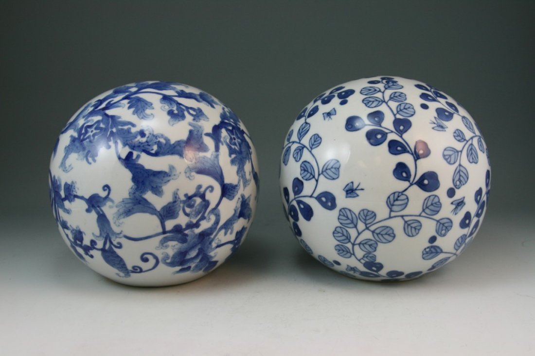 Pair Chinese Antique Blue And White Porcelain Balls: Pair Chinese Minguo Period blue&white porcelain balls: one with the design of blooming flowers amid scrolling vines; together with the other with the design of flying butterflies among twisting foliag