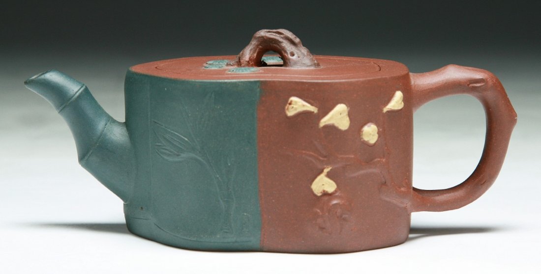 A Chinese Antique Zisha Teapot: A Chinese Antique Zisha Teapot; Size: L: 6"; H: 2-1/2"