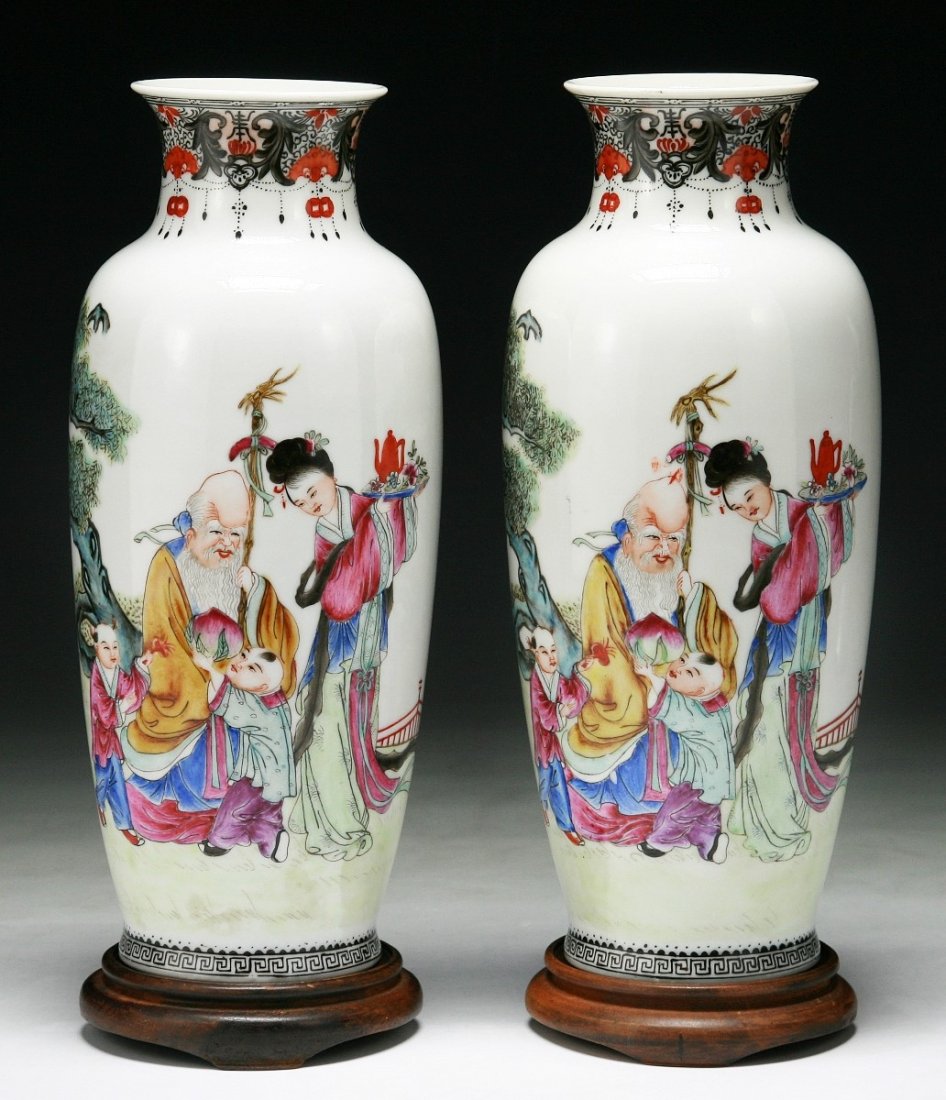 Pair of Chinese Antique Famille Rose Porcelain Vases: Pair of Chinese Antique Famille Rose Porcelain Vases: presented on wood stands; Size: H: 10"