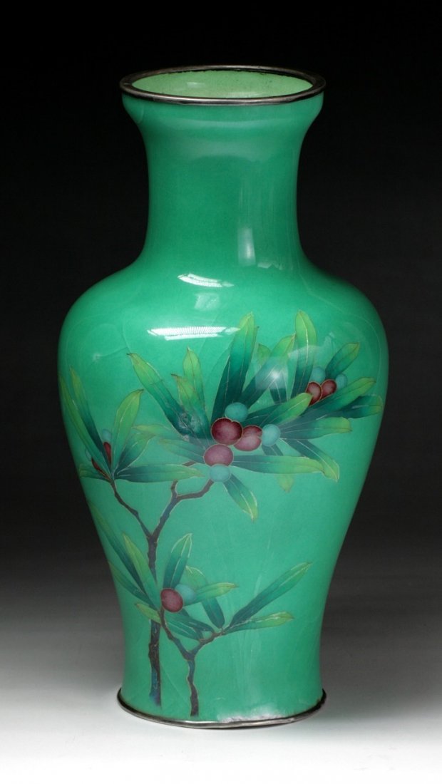 A Japanese Antique Silver Ando Cloisonne Vase: A Japanese Antique Silver Ando Cloisonne Vase: of elegant shouldered body with cylindrical neck, finely enameled with blooming branches, reserved on a bright apple green ground, of 19th Century; Size: